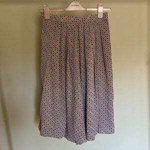 Vintage nylon skirt pant in floral print. Mint condition. Dry cleaned.